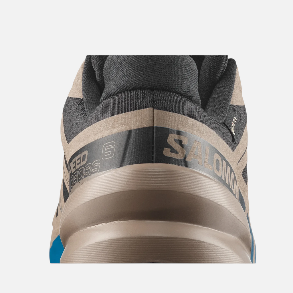 Vista posteriore delle scarpe da trail running Ares Sport Arezzo Salomon Speedcross in beige, nero e blu