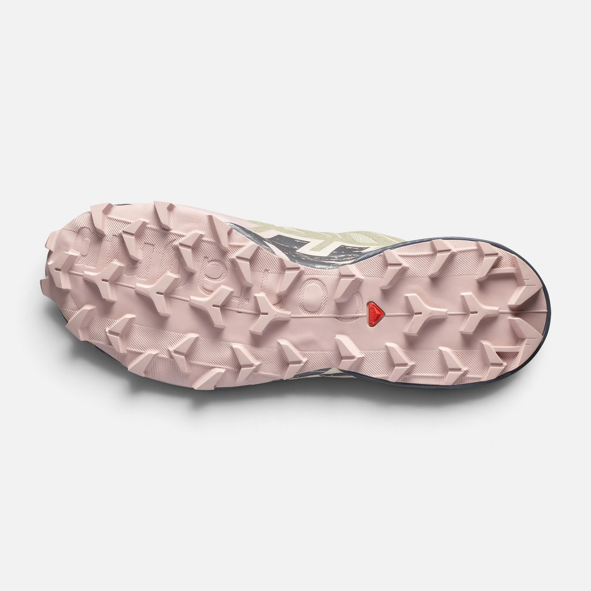 Suola rosa con tasselli aggressivi di una scarpa da trail running Ares Sport Arezzo per grip su terreni tecnici